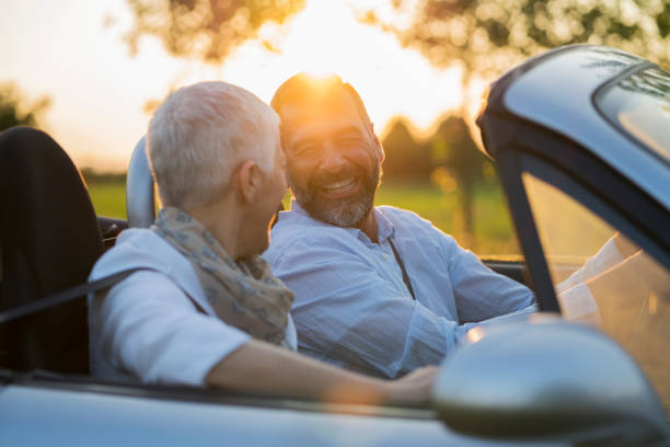 istock Mature couple at car 697975144