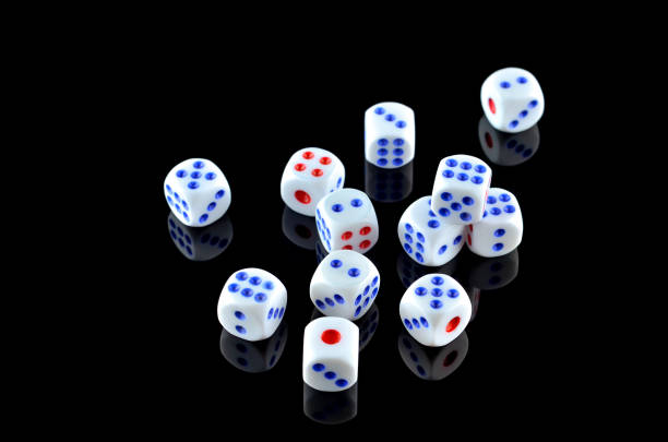 istock Group of White dice over black background 697975256