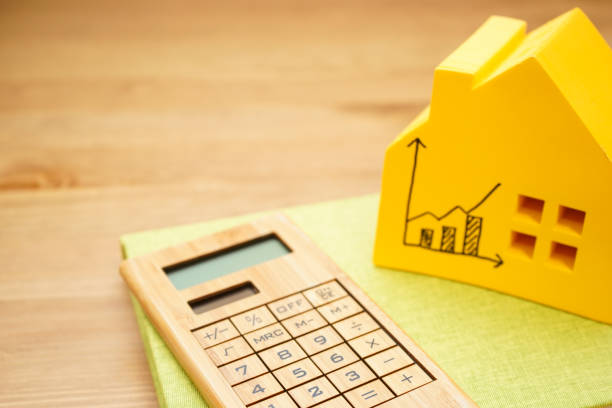 istock House of miniatures and calculator 697978124