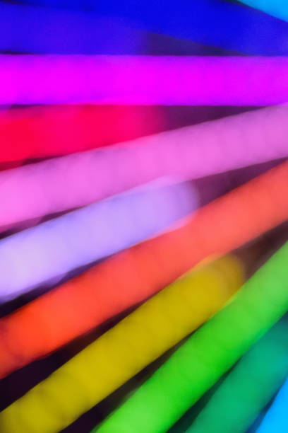 Abstract blur texture of colorful moving lights in vertical frame