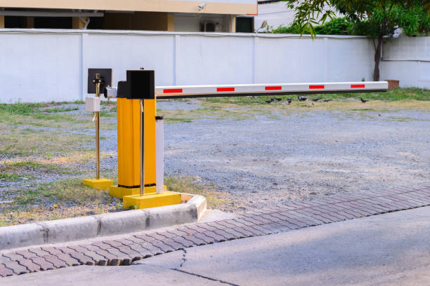 istock Automatic rising arm access barrier of buiding car park. 697978530