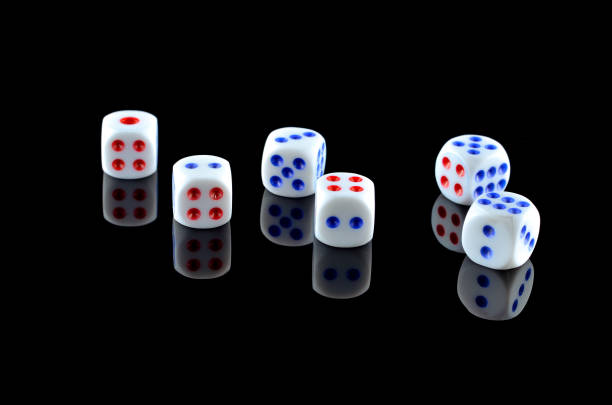 istock Group of White dice over black background 697979394