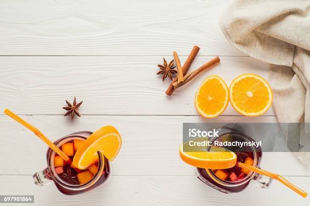 Two Fruit Tea In Vintage Glass Jars Stock Photo - Download Image Now - Backgrounds, Berry, Cinnamon