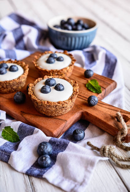 istock Granola cups filled with yoghurt and blueberry 697982150