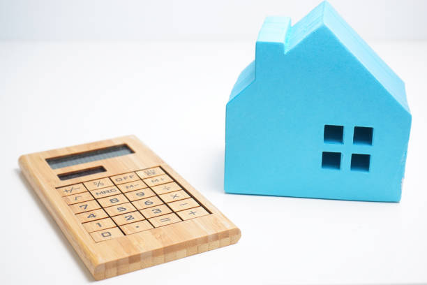 istock House of miniatures and calculator 697987024