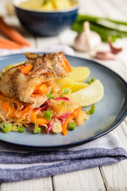 istock Pangasius fillets rolls stuffed with carrot and olives 697992218