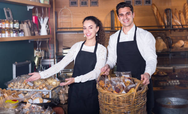 istock cooks selling tarts and sweet pastry 697998508