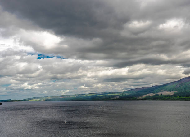 As we walked down from Drumnadrochit to Urquhart Castle which is a 3km walk, the scenery was fantastic, It was a cloudy day and the walk along the loch ness was amazing. Here is a view of Loch ness surrounded by hills and meadows. A lone boat sailing in the loch ness.