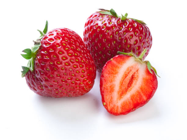 istock Beautiful strawberries isolated on white 698002502
