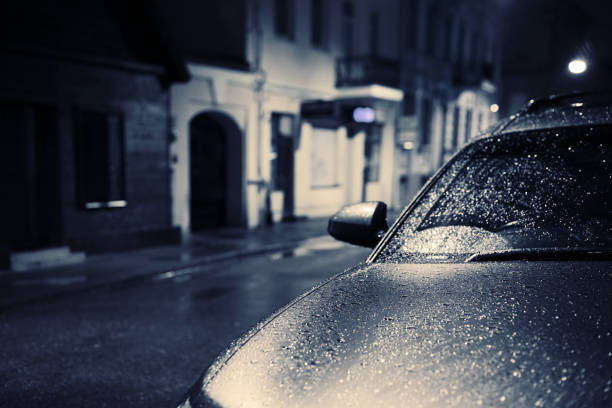 istock Night street wet with rain car 698005118