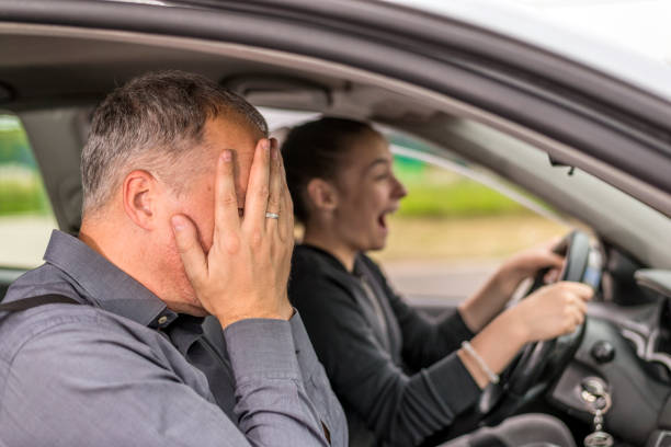 istock Father's Worst Nightmare Driving Daughter Crashing Car 698006034