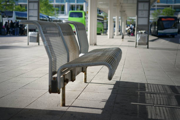 istock The metallic steel mesh bench at the bus terminal stop 698009958