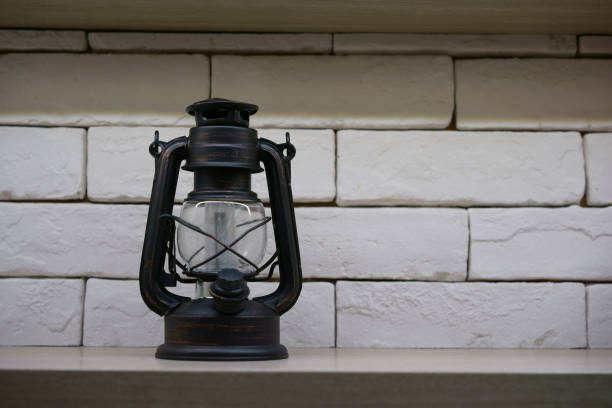 istock The old vintage metal lantern with fluorescense lamp inside 698015914