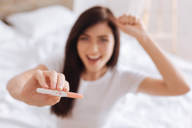 istock Selective focus on pregnancy test in female hands 698016284