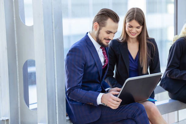 istock Business people with laptop 698034150