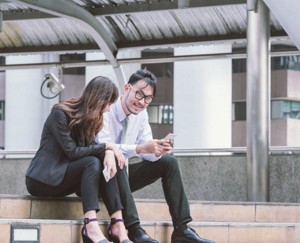 istock Business partners talking in an urban city setting 698035258