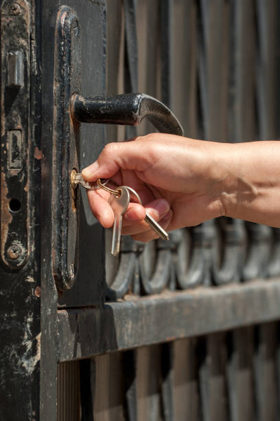 istock Woman opens the  door 698047600