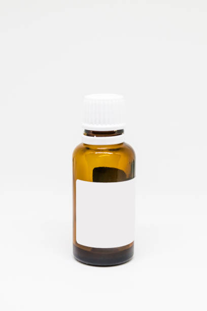 istock Liquid medicine in glass bottle 698047608