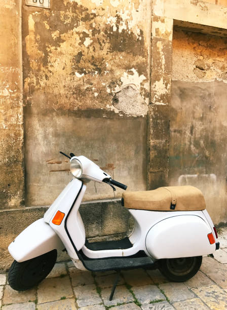 istock Vintage White Scooter, Ancient Sicilian Wall (Close-Up) 698050732