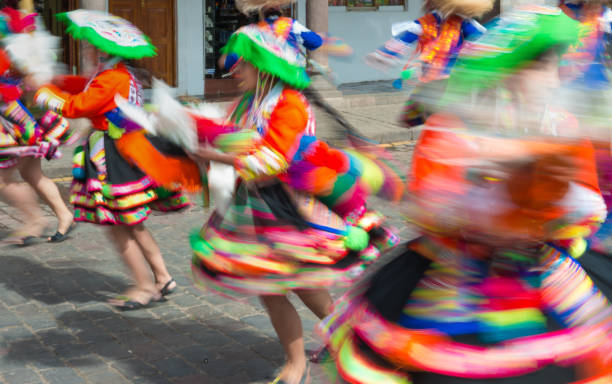 Inti Raymi Colors Abstract long exposure of Inti Raymi dancers on the Plaza de Armas square of Cusco during the festival of the sun in Peru. inti raymi stock pictures, royalty-free photos & images