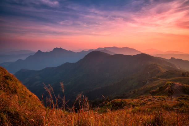 istock Sunset scene with the peak of mountain and cloudscape at Phu chi fa in Chiang rai, Thailand 698055708