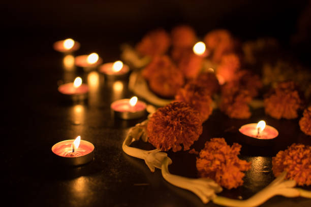 istock Deepabali - colourful candles are lit in darkness 698059172