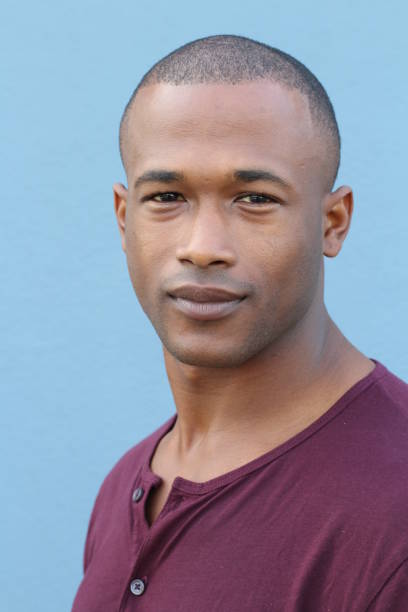 istock Close-up of handsome young dark-skinned man 698059312