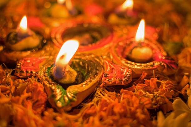 istock Deepabali - colourful candles are lit in darkness 698059390