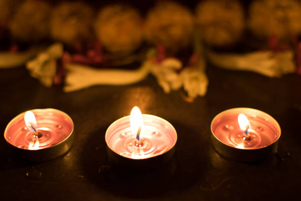 istock Deepabali - colourful candles are lit in darkness 698059572