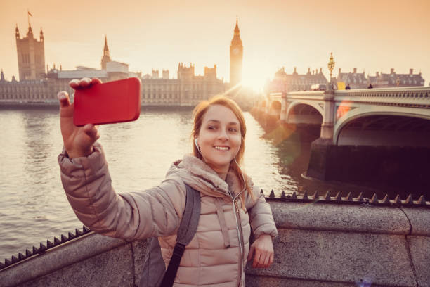 istock Tourist in London taking selfie 698059654