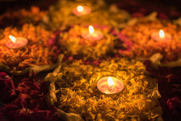 istock Deepabali - colourful candles are lit in darkness 698059694