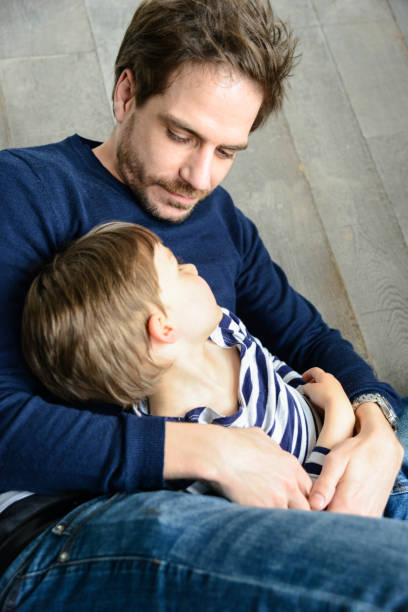 istock father and son have fun together 698061816