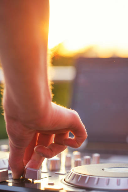 istock Dj mixing music outdoor. 698066950