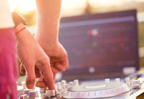 istock Dj mixing music outdoor. 698068342