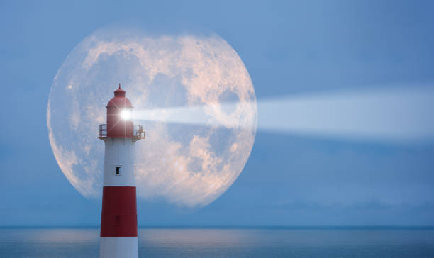 маяк и луна - storm lighthouse cloudscape sea стоковые фото и изображения