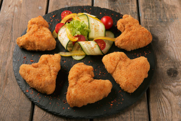 istock Chicken wings fried in breadcrumbs golden 698069302