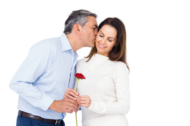 istock Lovely couple holding flower 698072720
