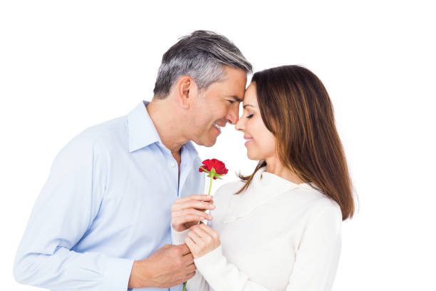 istock Lovely couple holding flower 698072788