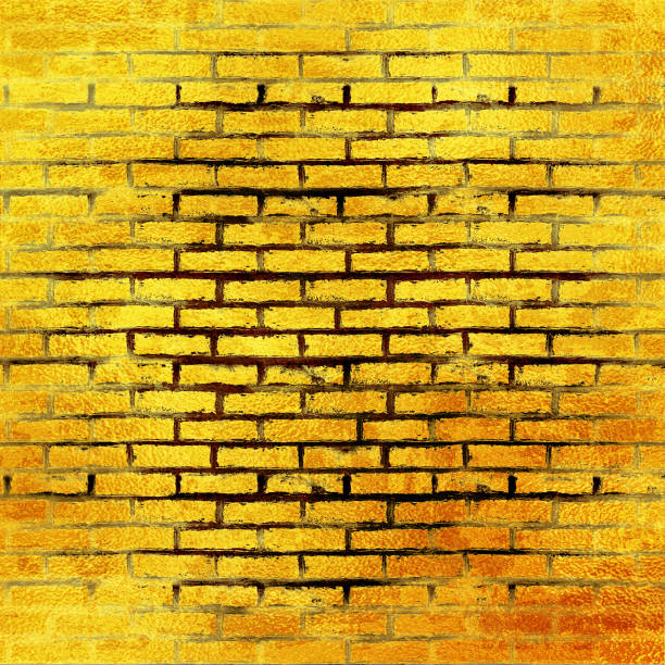 Gold brick wall texture or background. A wall of shiny gold blocks