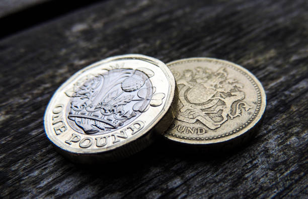 istock New and old one pound coins 698084636
