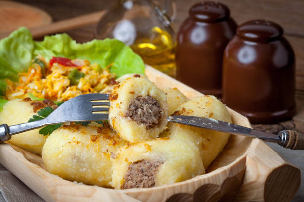 istock Potato dumplings stuffed with minced meat. 698088002