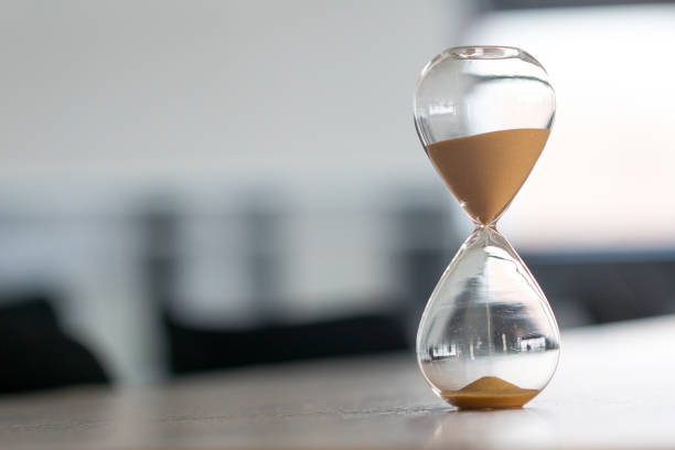 istock Sand clock, business time management concept 698096222