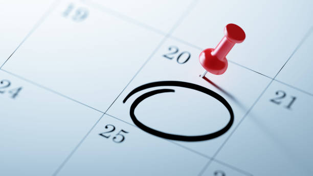 Calendar Concept Concept image of a Calendar with a red push pin. Closeup shot of a thumbtack attached. Circle mark written on a white notebook to remind you an important appointment. calendar date circled stock pictures, royalty-free photos & images