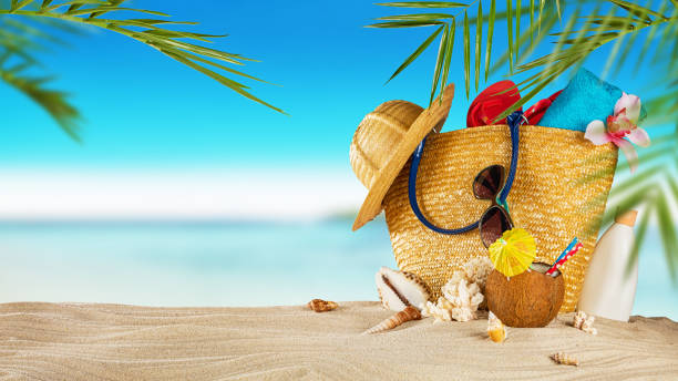istock Tropical beach with accessories on sand, summer holiday background. 698123622