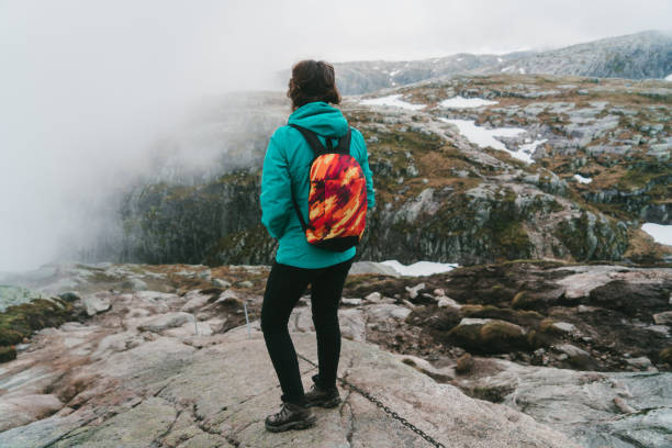 istock Woman hiking in mountains  in Norway 698123890