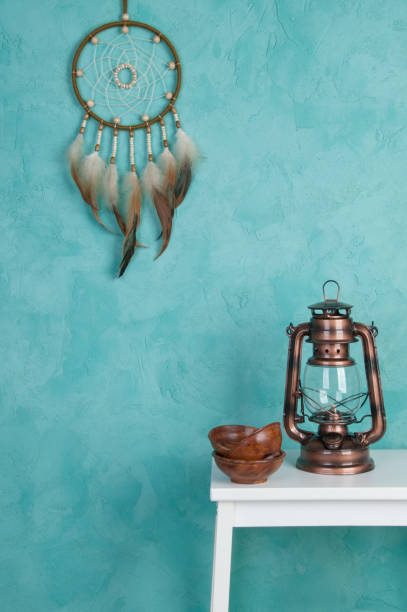 istock Olive dream catcher on aquamarine 698132870