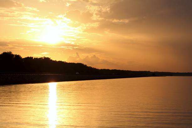 istock Sunset Over a Reservoir Spillway 698137780
