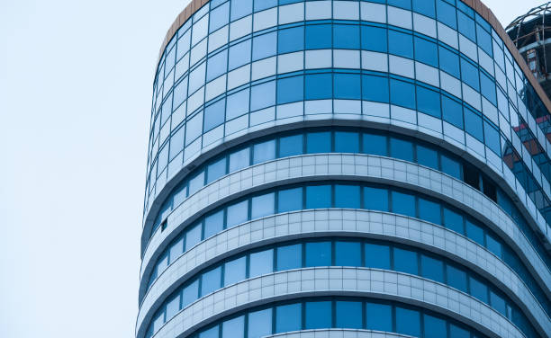 istock Business building on the sky background 698139394
