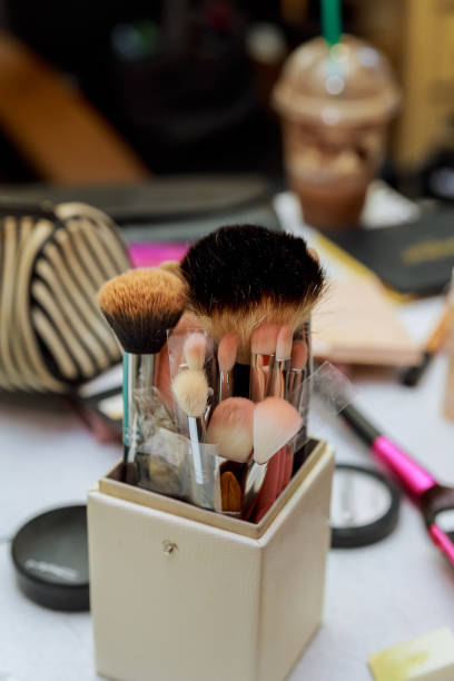 istock Professional makeup brushes in tube. Dirty makeup tools. 698143648
