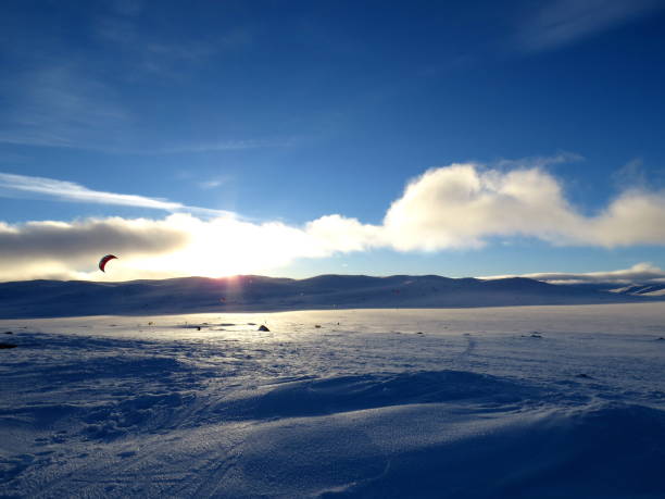istock Wind surfing and snowkiting in winter 698152232